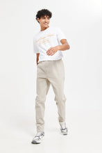 Load image into Gallery viewer, بنطلون رياضي باللون البيج للرجال