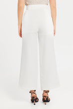 Load image into Gallery viewer, بنطلون مزين بأزرار جانبية باللون العاجي للنساء