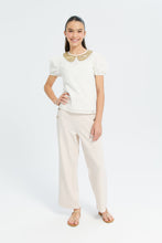 Load image into Gallery viewer, توب مزين بياقة بيتر بان من الترتر باللون البيج للبنات الكبار