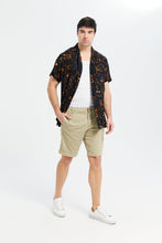 Load image into Gallery viewer, قميص فضفاض مطبوع باللون الأسود للرجال