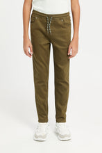 Load image into Gallery viewer, بنطال جينز كبار الأولاد باللون الزيتوني