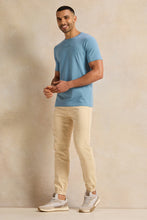 Load image into Gallery viewer, بنطال رياضي رجالي من قماش الدنيم باللون الكريمي