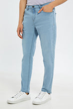 Load image into Gallery viewer, بنطلون جينز فاتح بخمسة جيوب بقصّة ضيقة