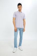 Load image into Gallery viewer, بنطلون جينز فاتح بخمسة جيوب بقصّة ضيقة