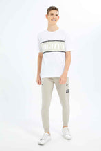 Load image into Gallery viewer, تيشيرت واسع مطبوع باللون البيج للأولاد الكبار