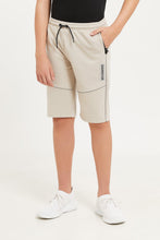 Load image into Gallery viewer, شورت رياضي مزين باللون البيج للأولاد الكبار