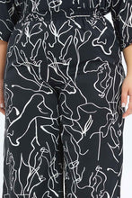 Load image into Gallery viewer, بنطلون واسع باللون الأبيض والأسود للنساء