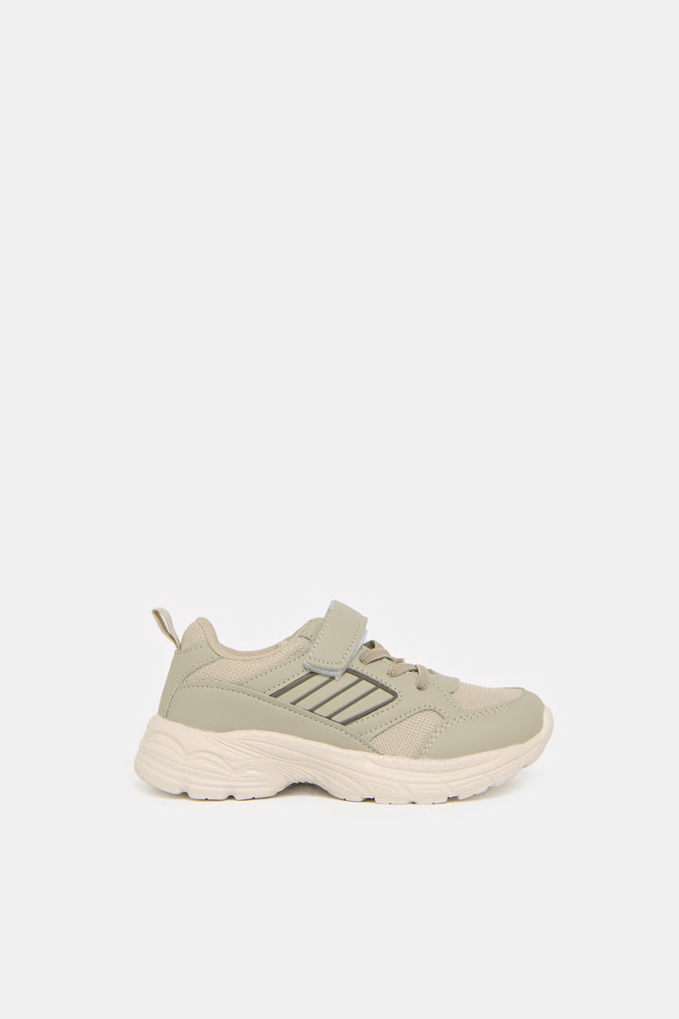 حذاء رياضي مطاطي سميك للأولاد باللون البيج
