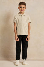 Load image into Gallery viewer, قميص بولو مطبوع للأولاد باللون البيج الفاتح
