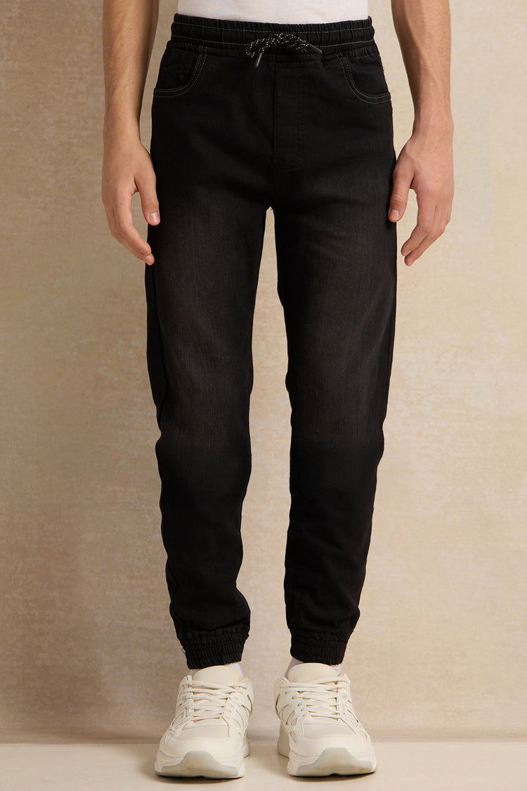 بنطال رياضي من قماش الدنيم باللون الأسود للأولاد الكبار