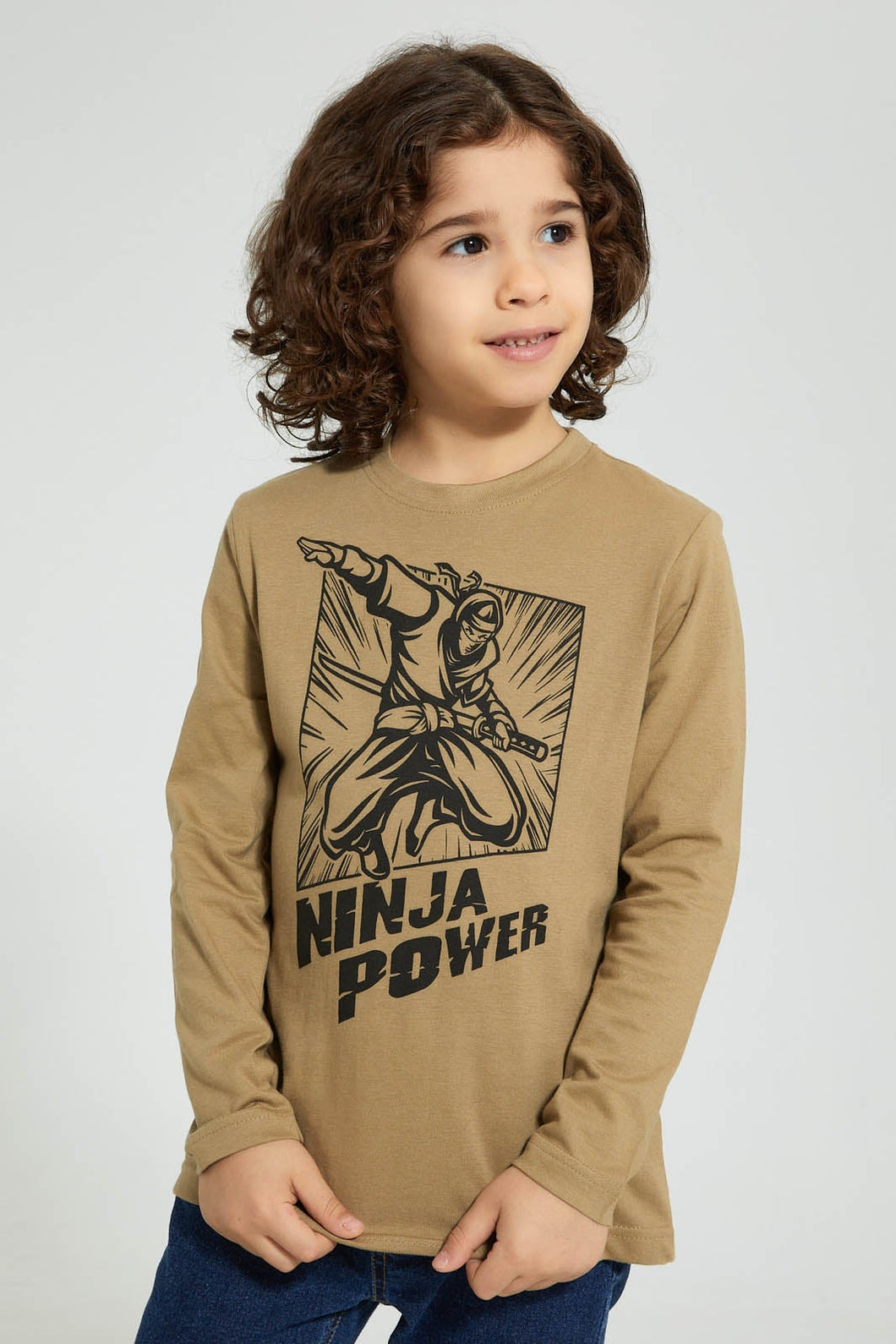 Beige Ninja Power Printed Long Sleeved T-shirt تيشيرت باللون البيج مطبوع بأكمام طويلة