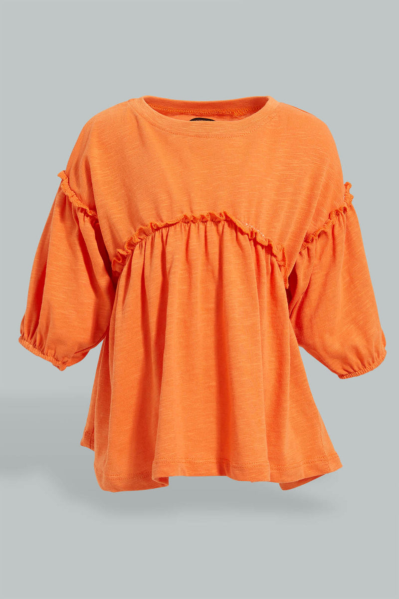 Orange Long Sleeved Blouse بلوزة باللون البرتقالي بأكمام طويلة