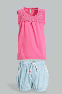Pink Sleeveless T-Shirt With Blue Short Set (2 Piece) طقم كاجوال مزين باللون الوردي والأزرق (قطعتين)