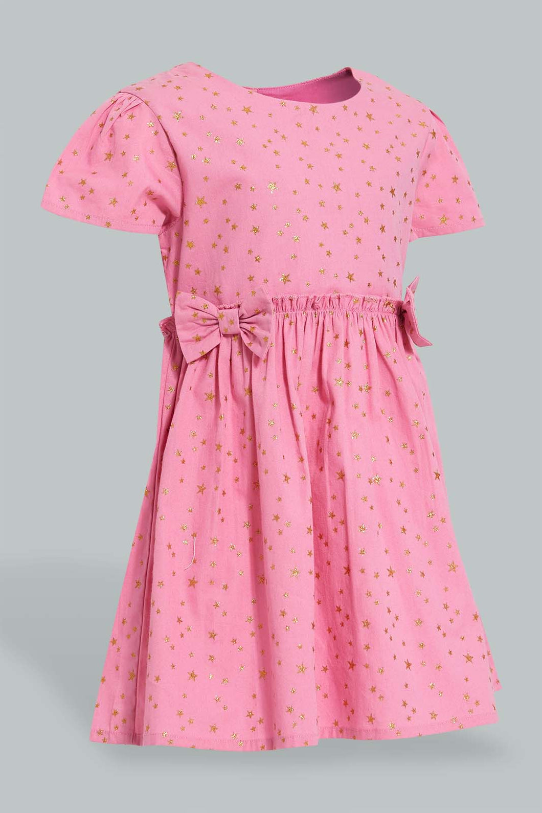 Pink Printed Dress With Bow فستان وردي مكشكش مطبوع ومزين بفيونكة