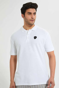 White Polo Shirt With Chest Logo قميص بولو باللون الأبيض بطبعة لوجو